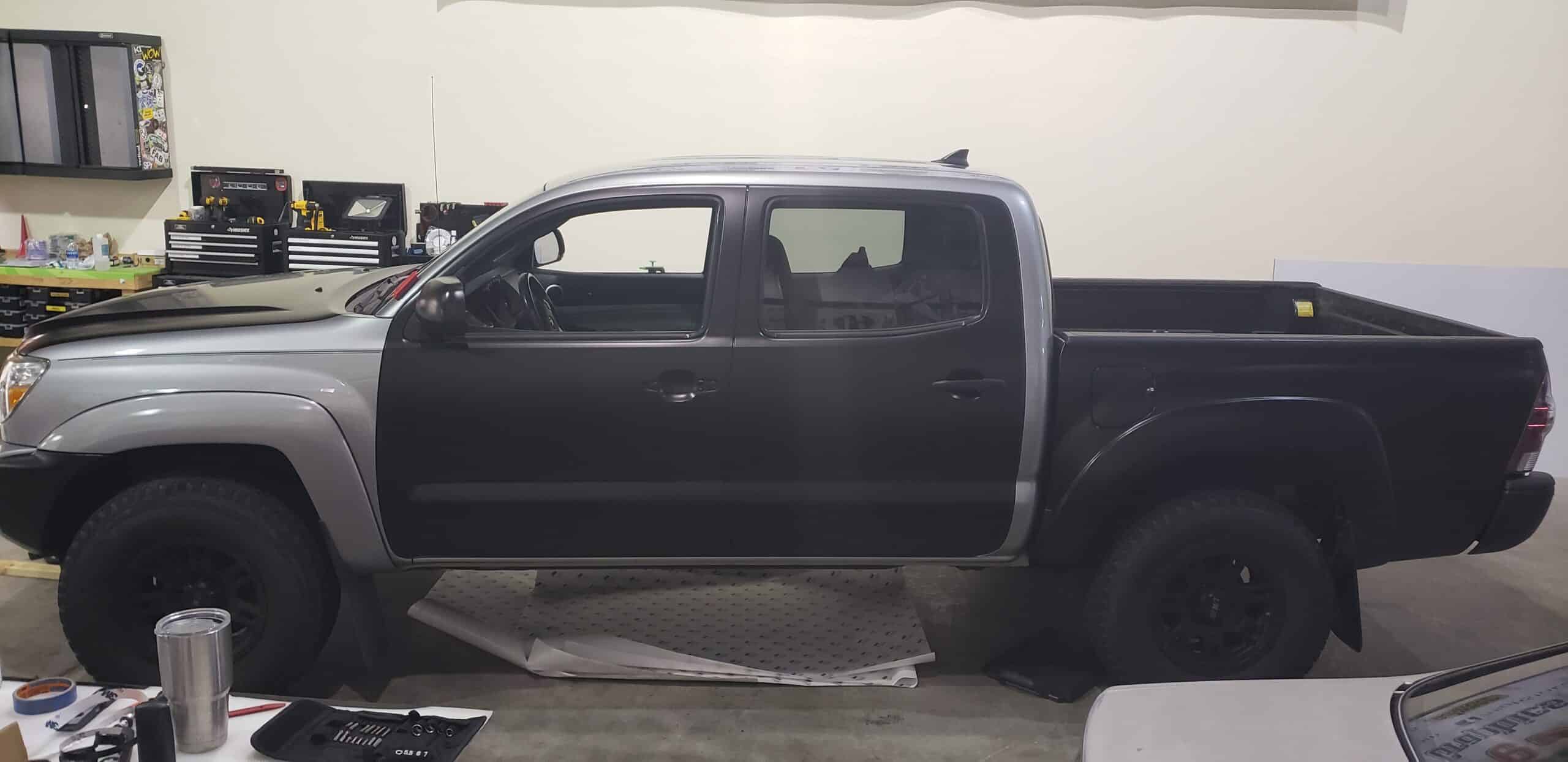 Matte black color-change wrap in progress, by High Stakes Creative