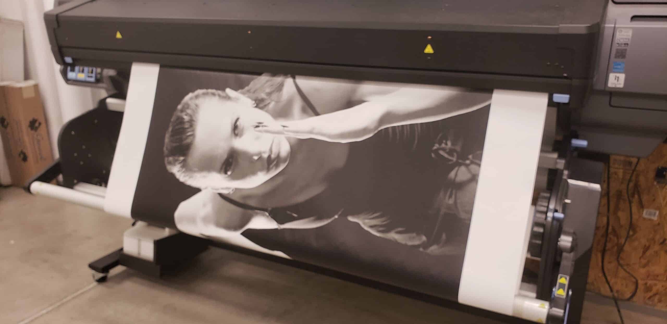 Printing the athlete murals in our Kennesaw shop, Twisted Cycle, Woodstock, GA, by High Stakes Creative