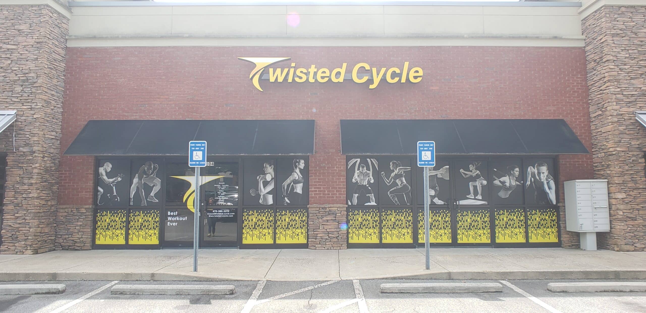 Illuminated sign and athlete window graphics, Twisted Cycle, Woodstock, GA, by High Stakes Creative