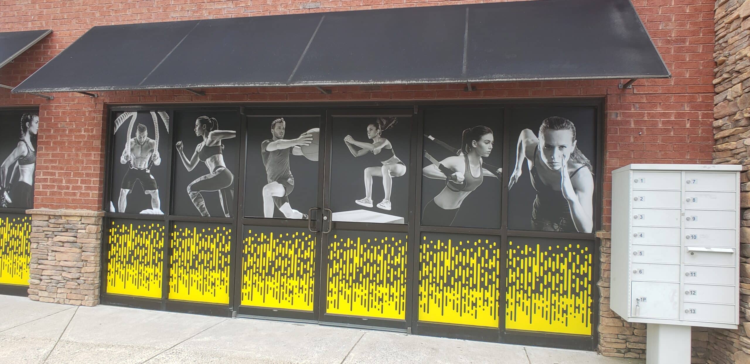 Athlete window graphics, Twisted Cycle, Woodstock, GA, by High Stakes Creative