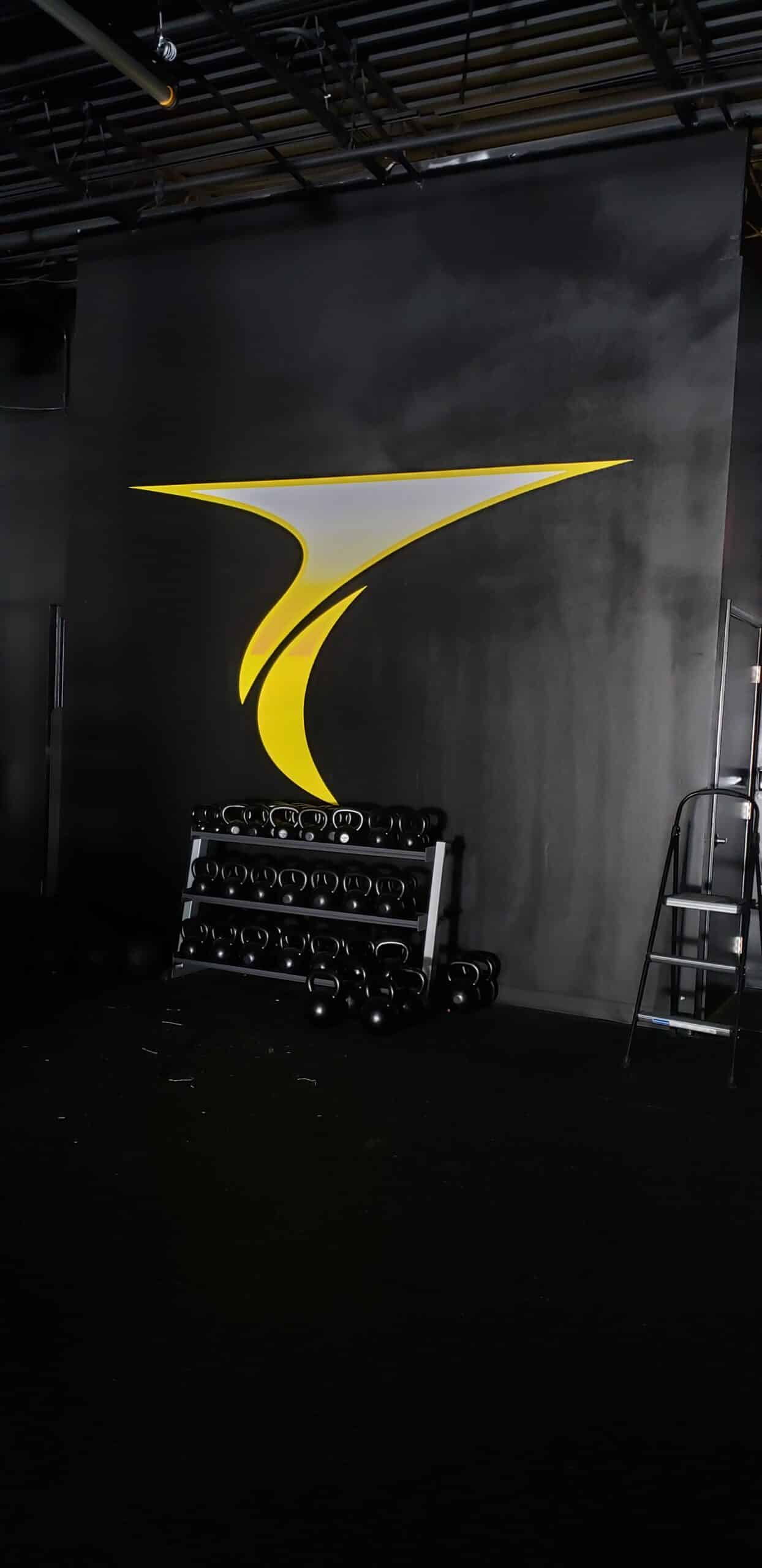 Logo feature wall, Twisted Cycle, Woodstock, GA, by High Stakes Creative