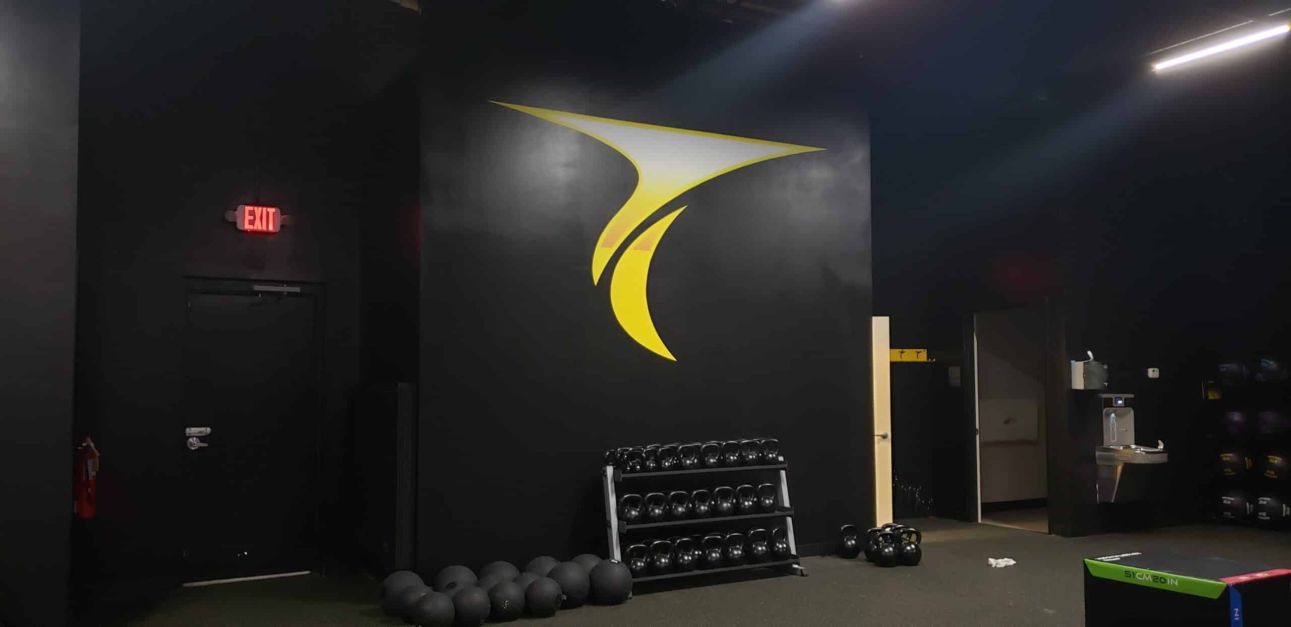Logo feature wall, Twisted Cycle, Woodstock, GA, by High Stakes Creative