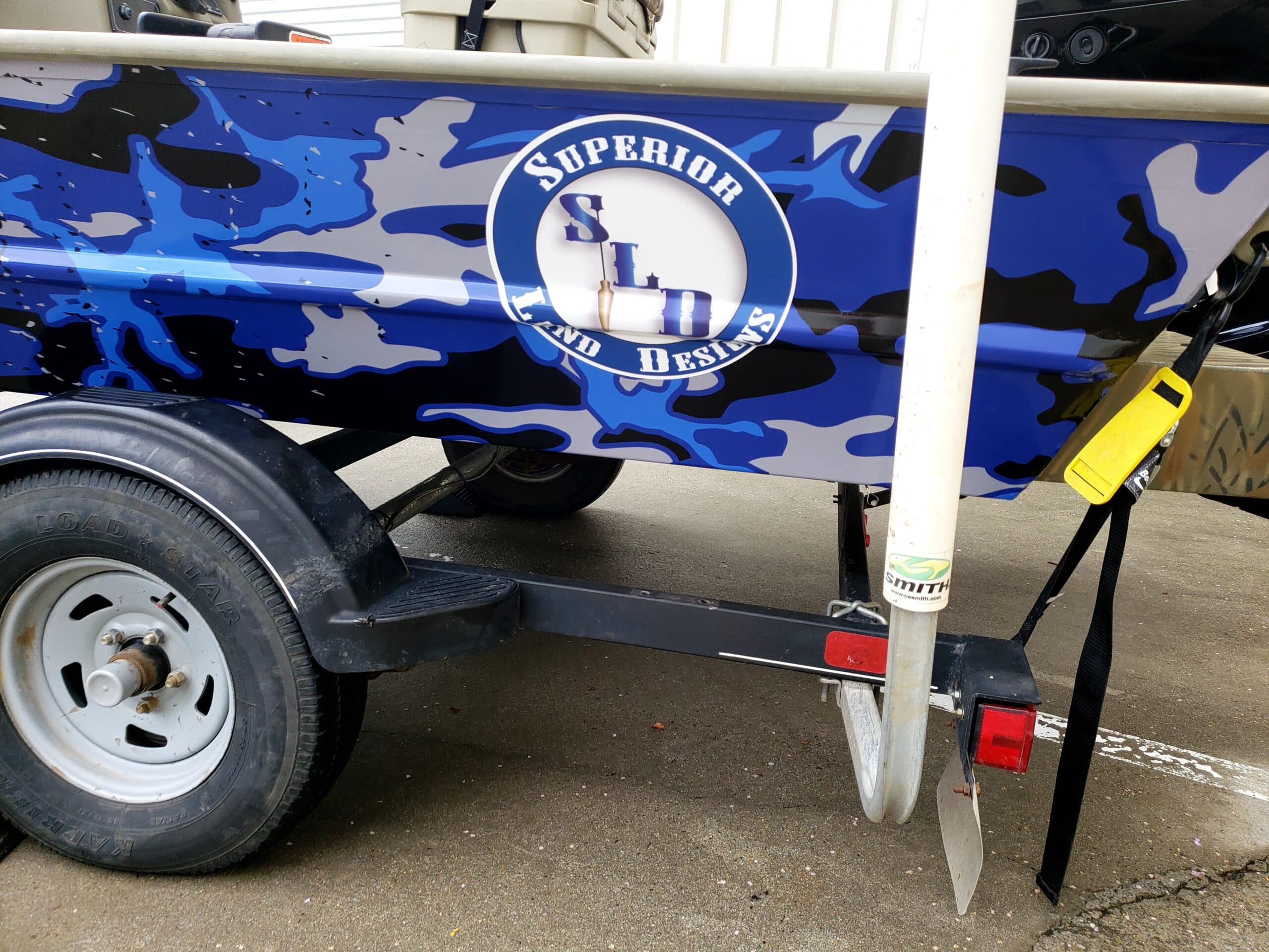 Custom camo boat wrap, by High Stakes Creative