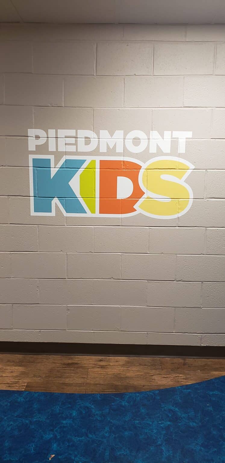 Children's ministry logo and welcome walls, Piedmont Kids, Marietta, GA, by High Stakes Creative