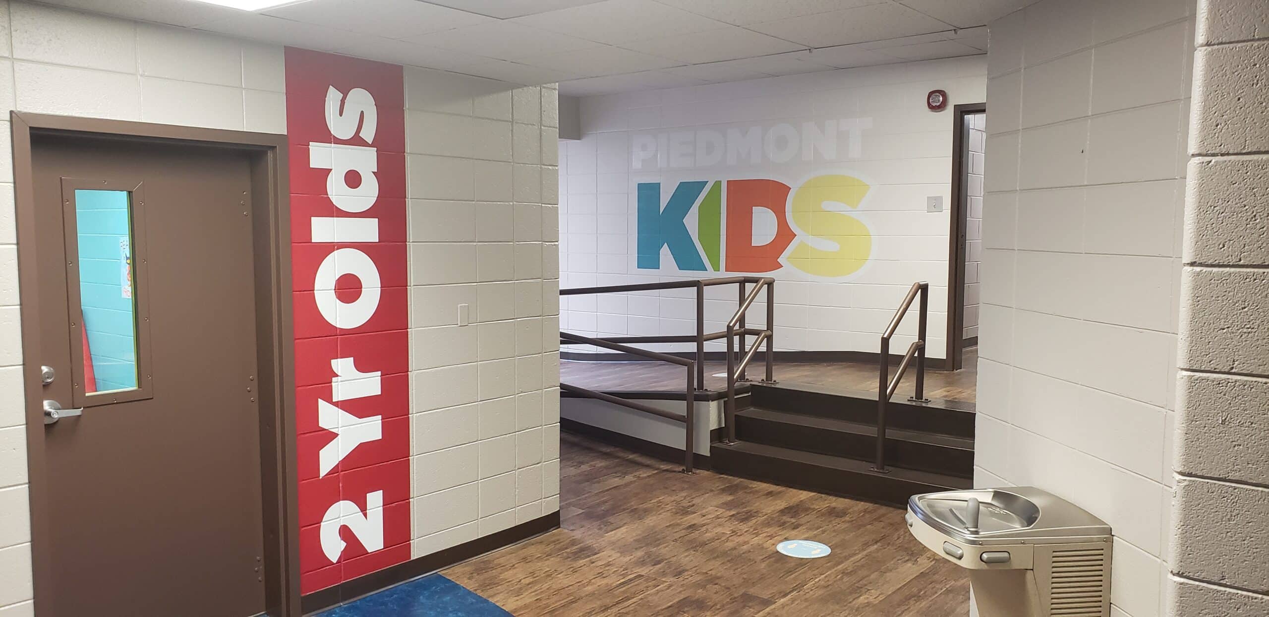 Classroom name graphics and logo wall, Piedmont Kids, Marietta, GA, by High Stakes Creative