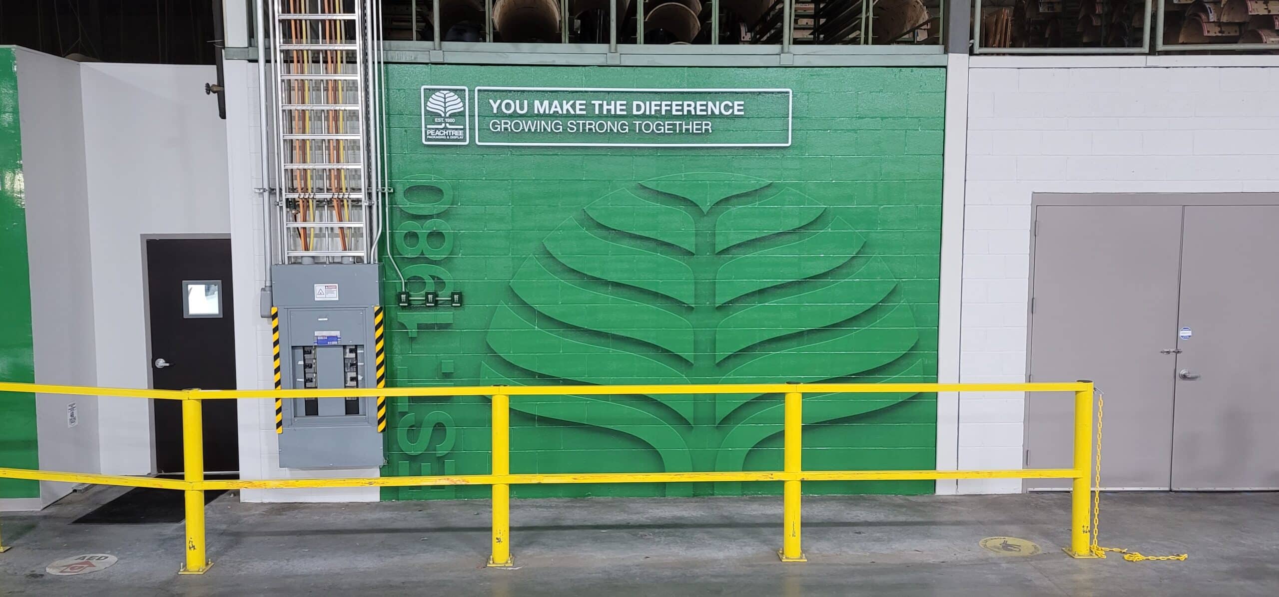 Warehouse culture wall, by High Stakes Creative