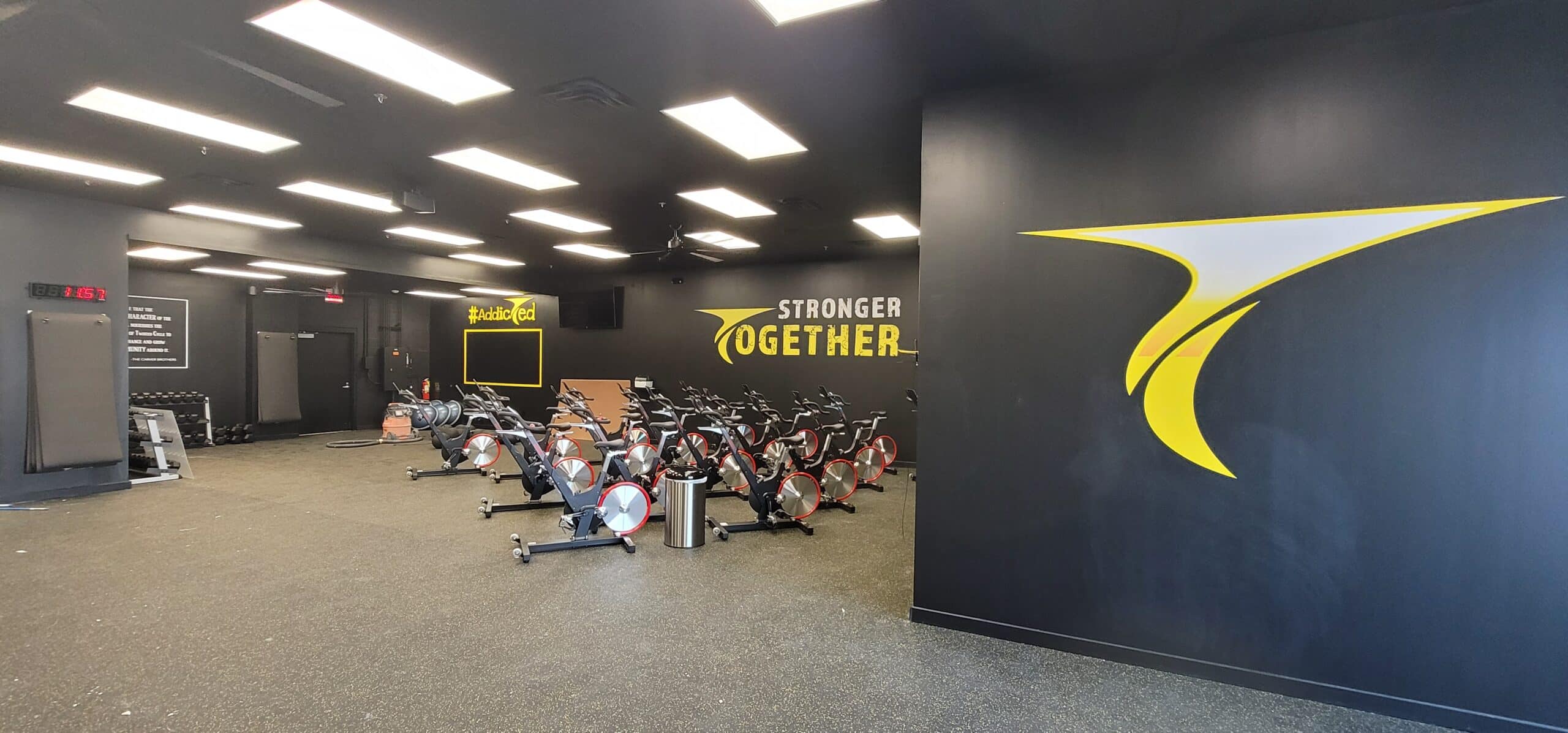 Stronger Together spin studio wall, Twisted Cycle, Woodstock, GA, by High Stakes Creative