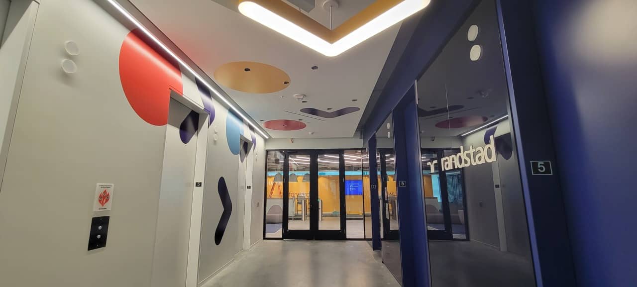 Elevator lobby and corridor wall graphics, by High Stakes Creative