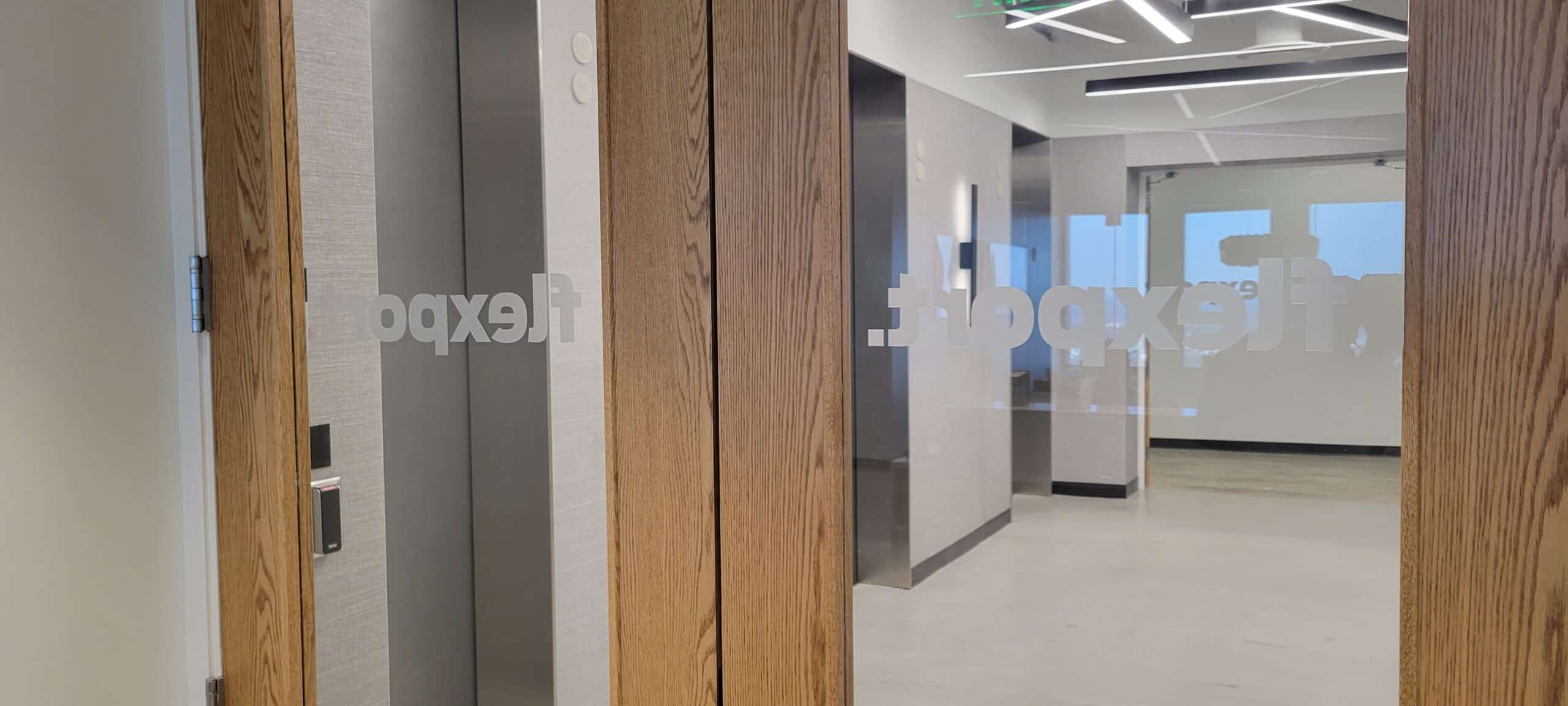 Logo glass graphics, Flexport, Atlanta, GA, by High Stakes Creative