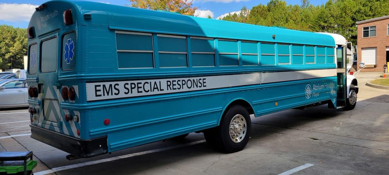 EMS Special Response bus wrap, rear quarter, Atrium Health Floyd, by High Stakes Creative