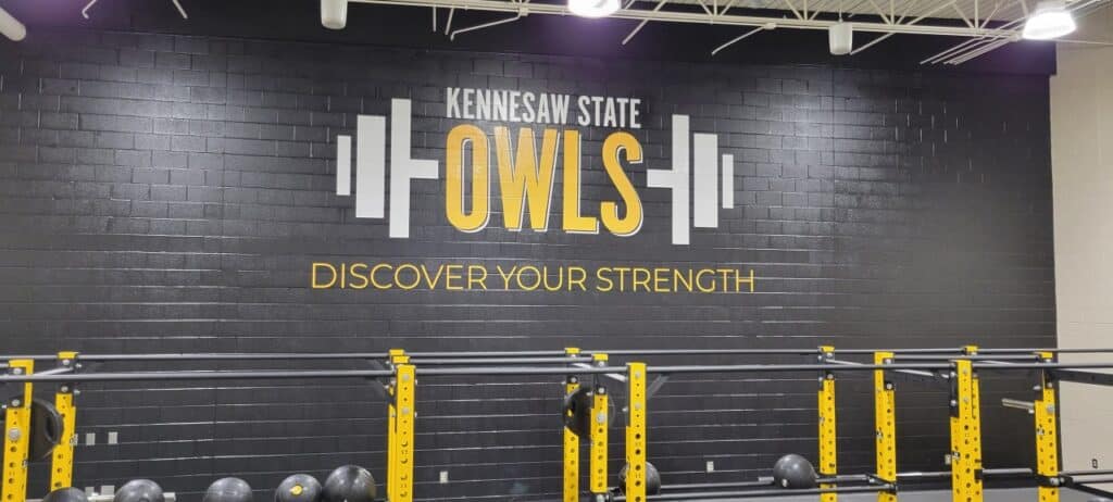 Owls weight room feature wall, Kennesaw State University, Kennesaw, GA, by High Stakes Creative