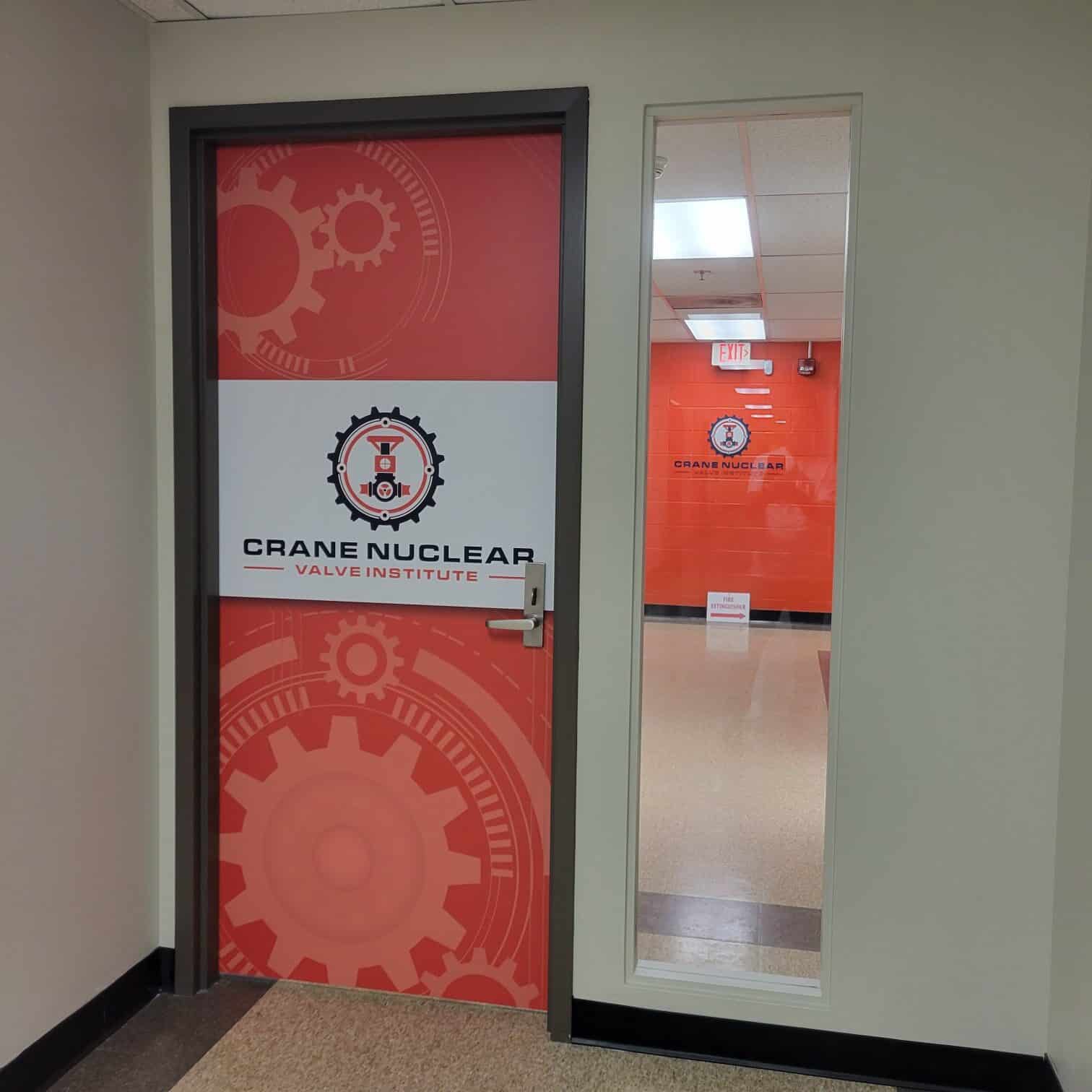 Branded door and sidelight graphics, Crane Nuclear, Kennesaw, GA, by High Stakes Creative