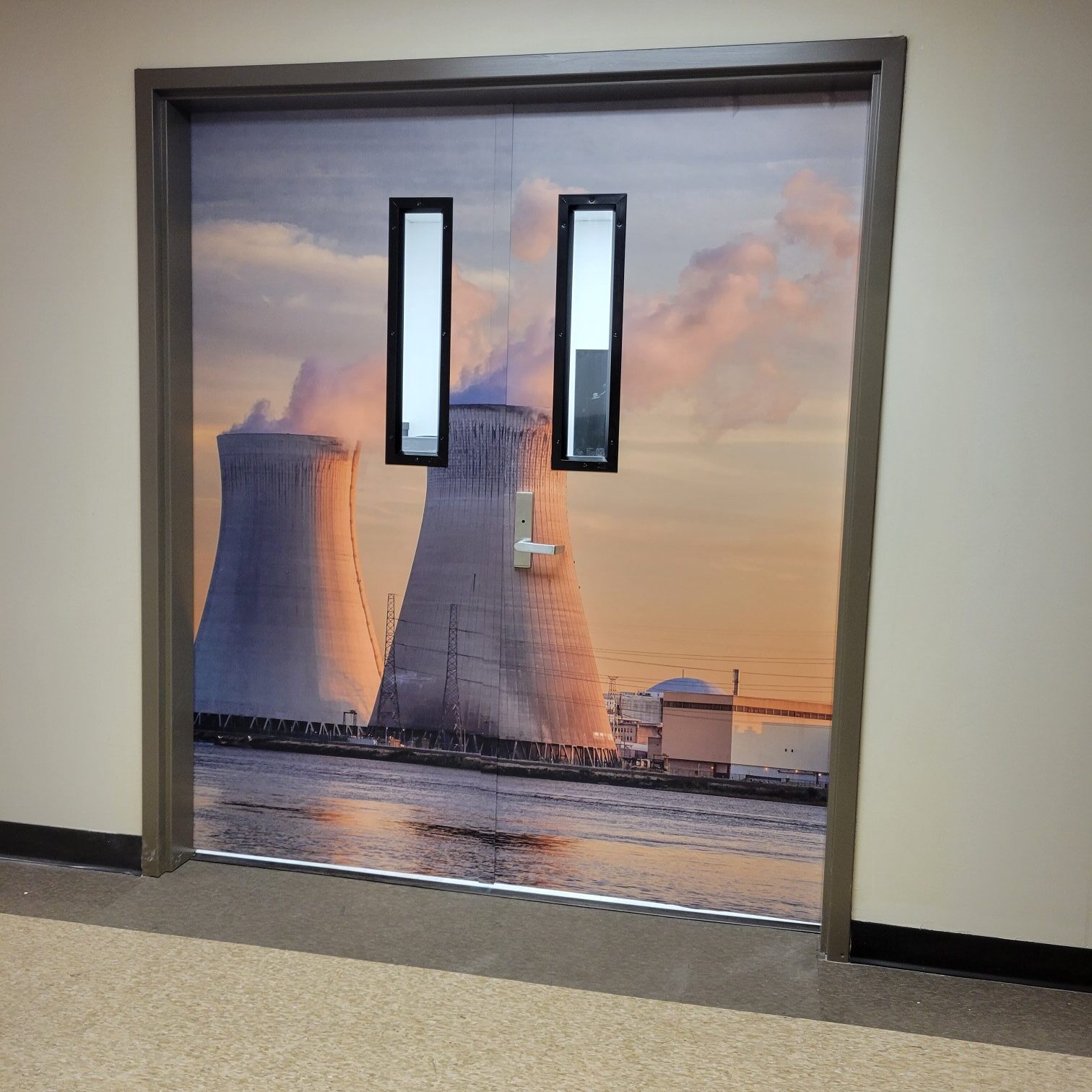 Cooling tower door mural, Crane Nuclear, Kennesaw, GA, by High Stakes Creative