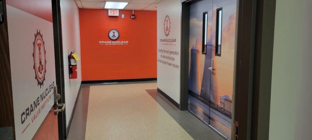 Branded training center corridor, Crane Nuclear, Kennesaw, GA, by High Stakes Creative