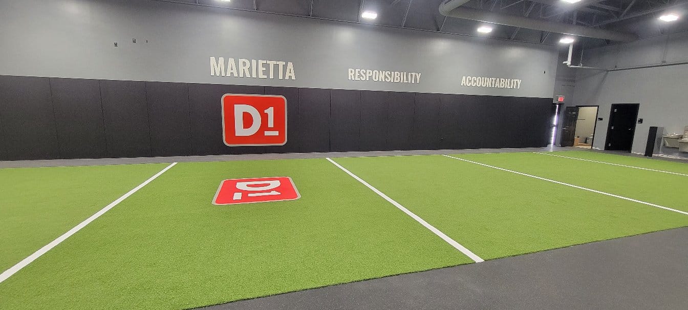 Turf gym branded wall, D1 Training, Marietta, GA, by High Stakes Creative