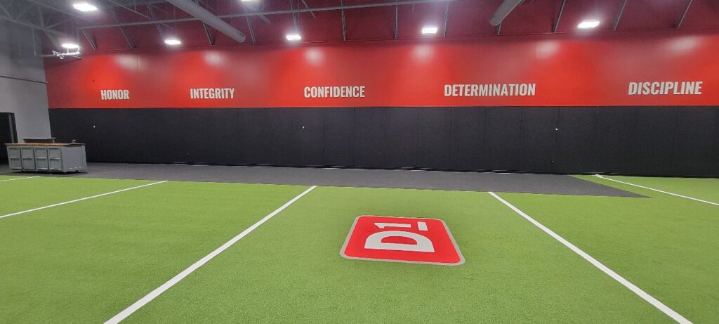 Turf gym core values wall, D1 Training, Marietta, GA, by High Stakes Creative