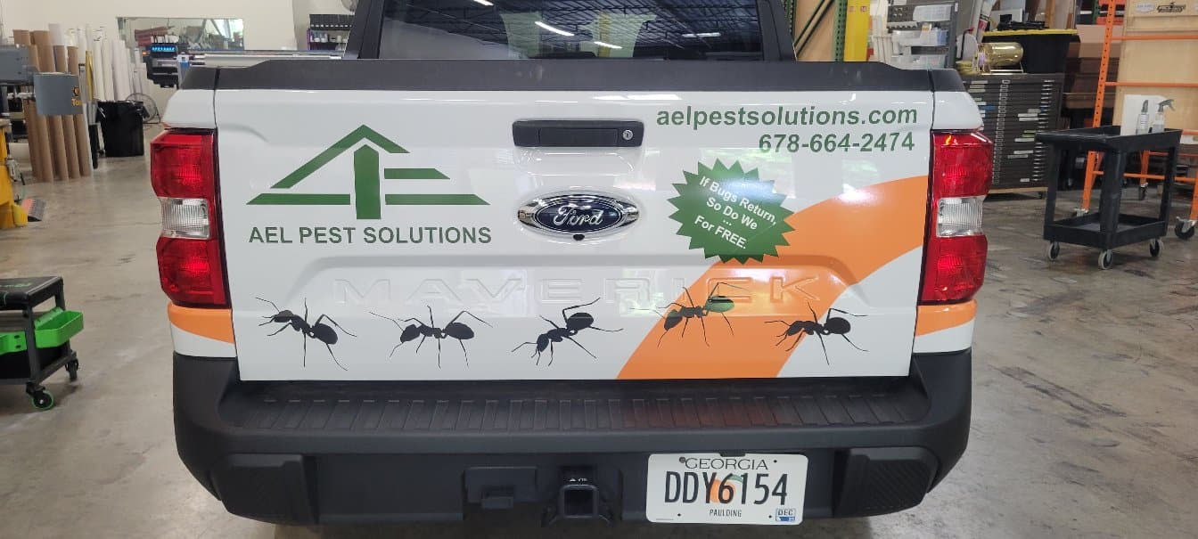 Tailgate graphics, AEL Pest Solutions, by High Stakes Creative