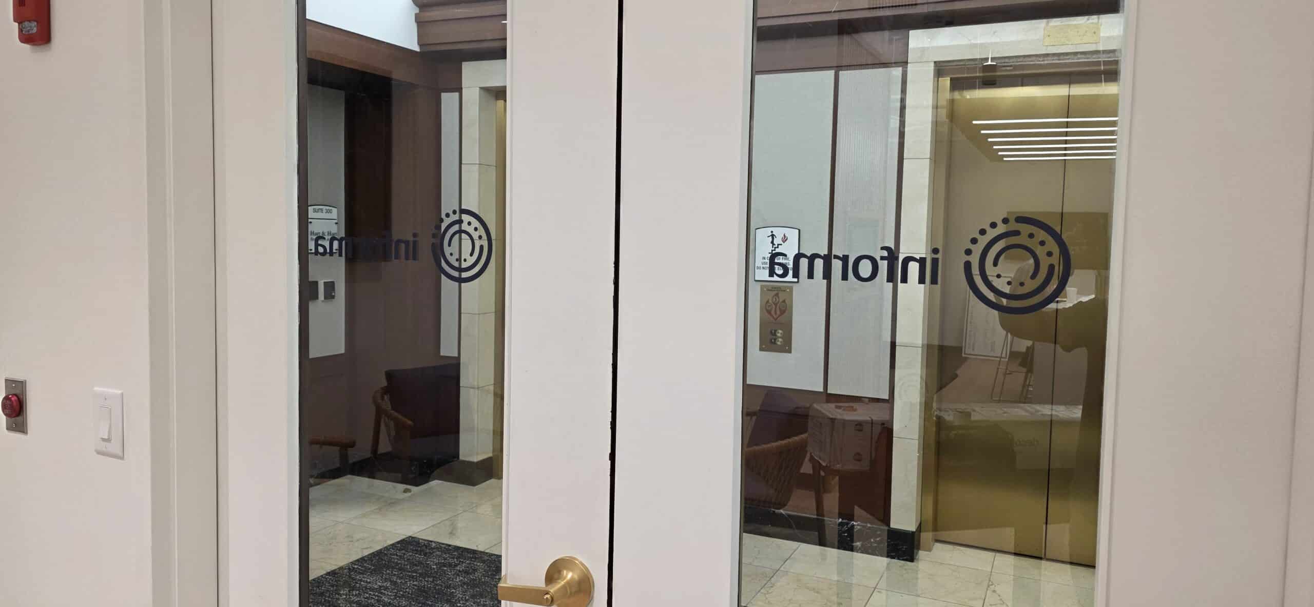 Logo decals on glass doors, Informa, Sandy Springs, GA, by High Stakes Creative