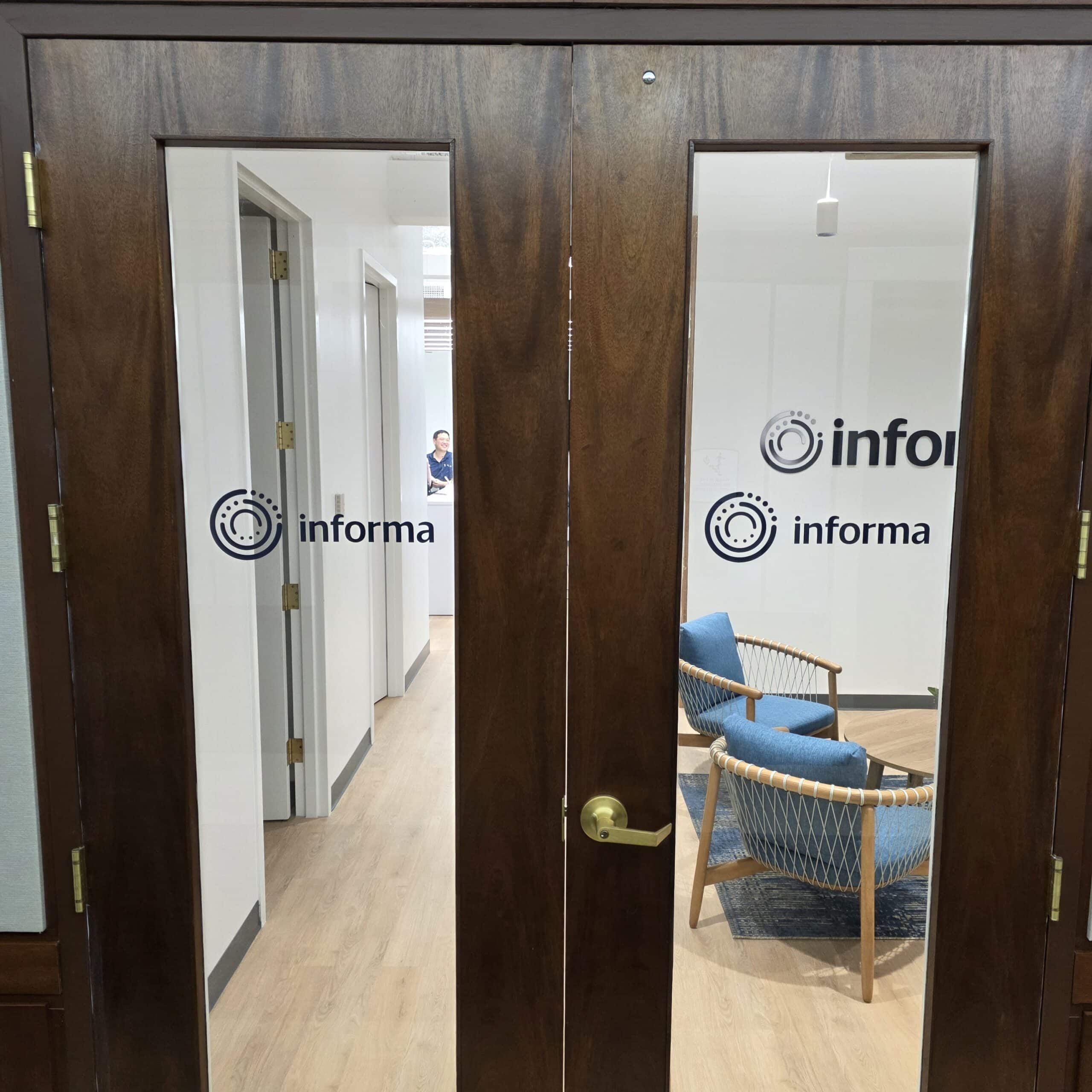 Logo decals on glass doors, Informa, Sandy Springs, GA, by High Stakes Creative