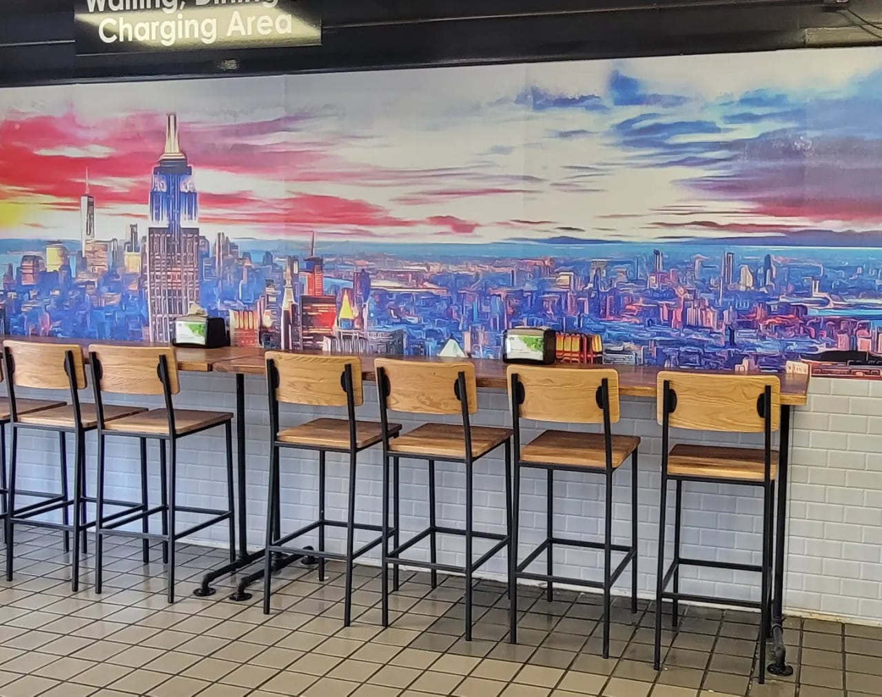 NYC skyline cafe mural, by High Stakes Creative