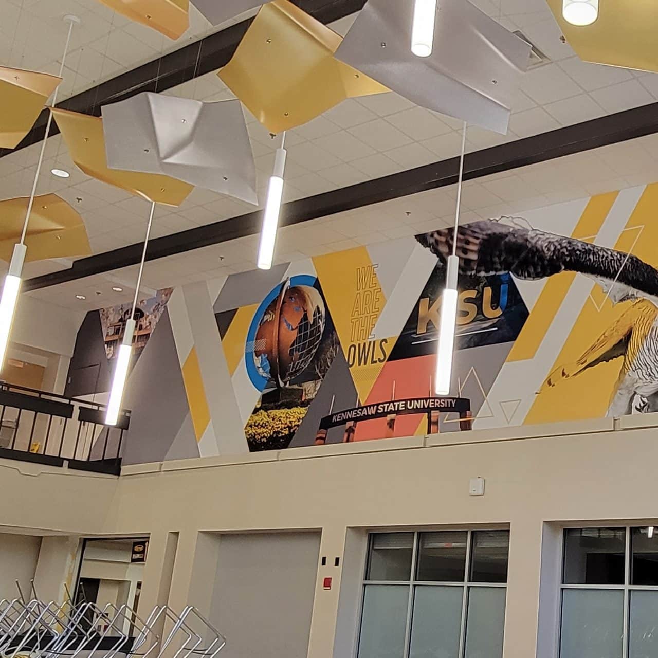 Athletics atrium wall murals, Kennesaw State University, Kennesaw, GA, by High Stakes Creative