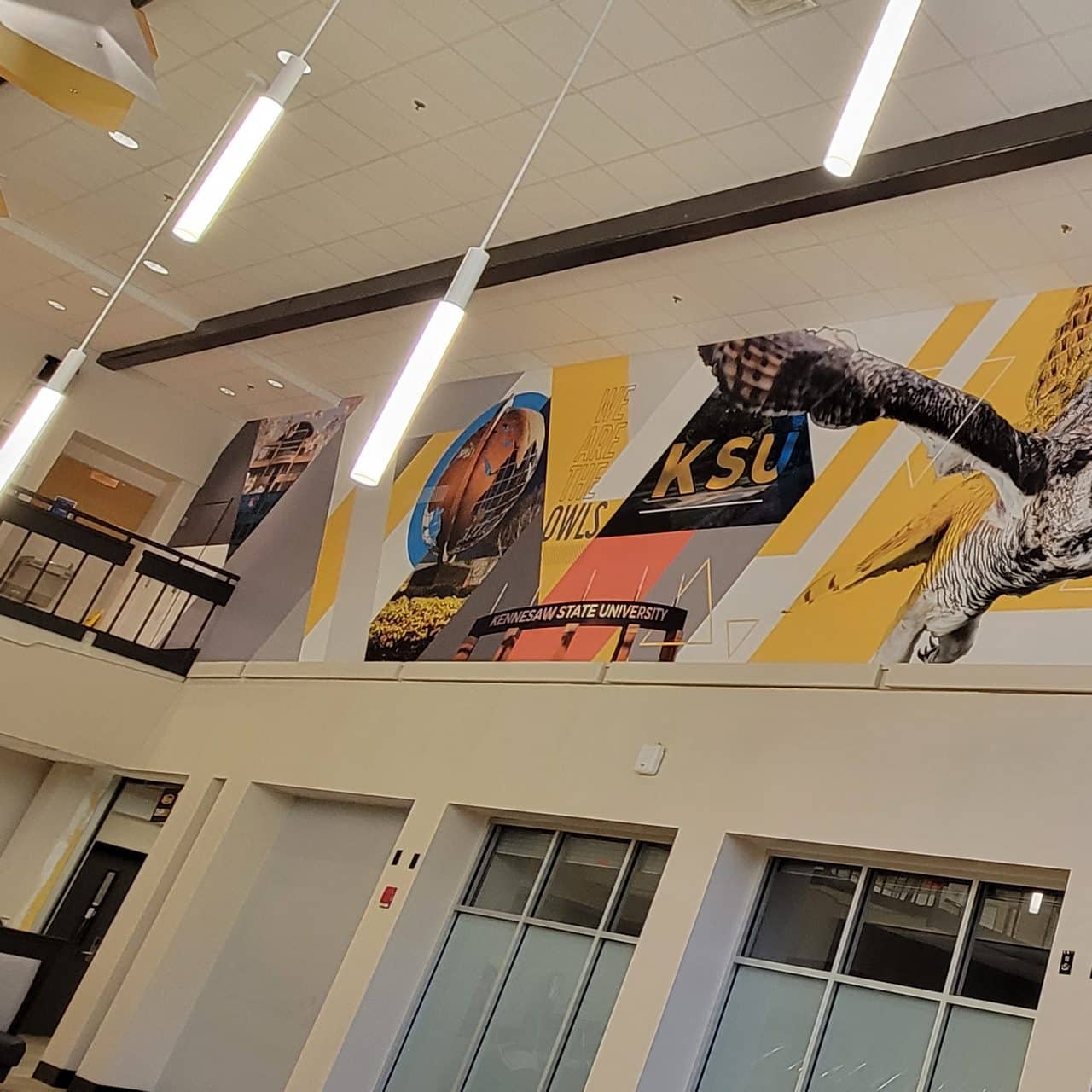Athletics atrium wall murals, Kennesaw State University, Kennesaw, GA, by High Stakes Creative