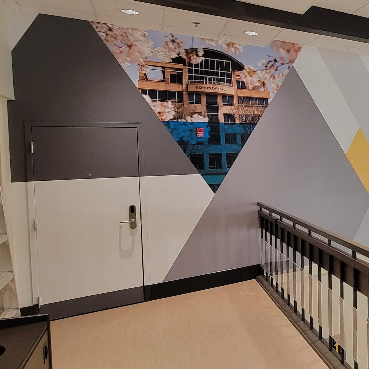 Athletics atrium wall murals, Kennesaw State University, Kennesaw, GA, by High Stakes Creative