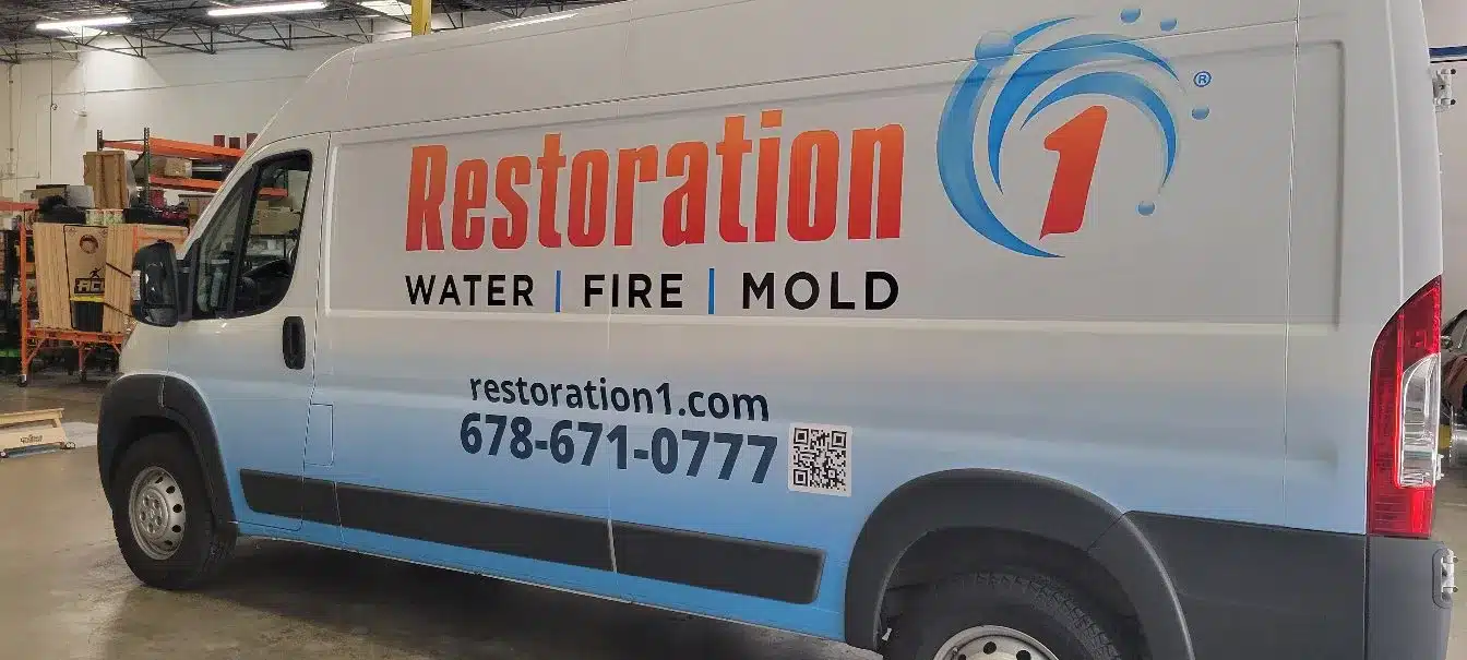 Traffic on I-285 showcasing fleet wraps on vehicles promoting local Atlanta businesses