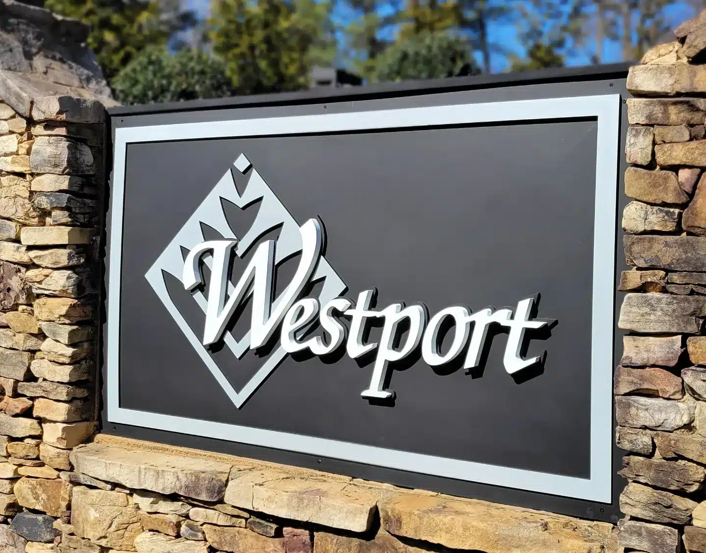 Examples of sign design options showing different materials and styles