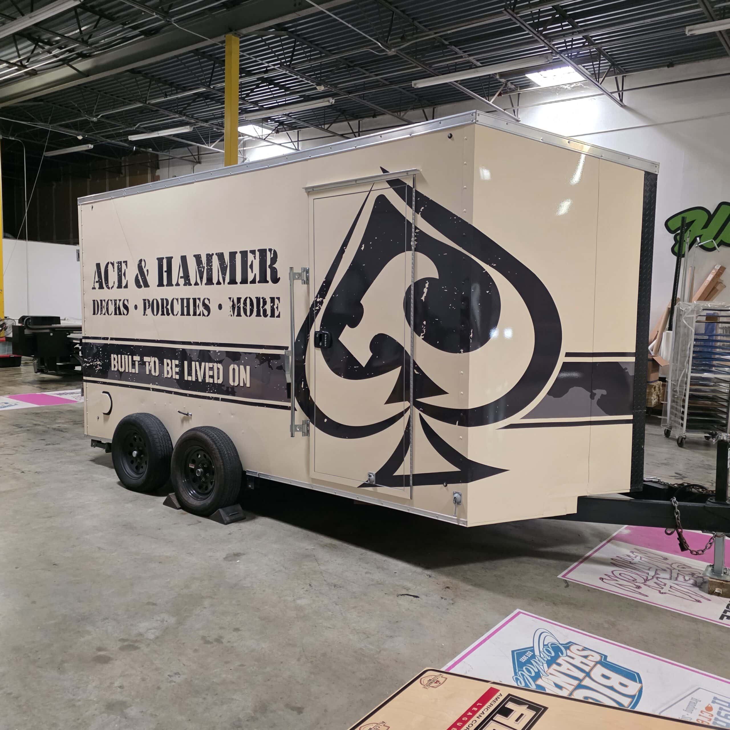 Enclosed trailer wrap in shop, Ace & Hammer, Kennesaw, GA, by High Stakes Creative