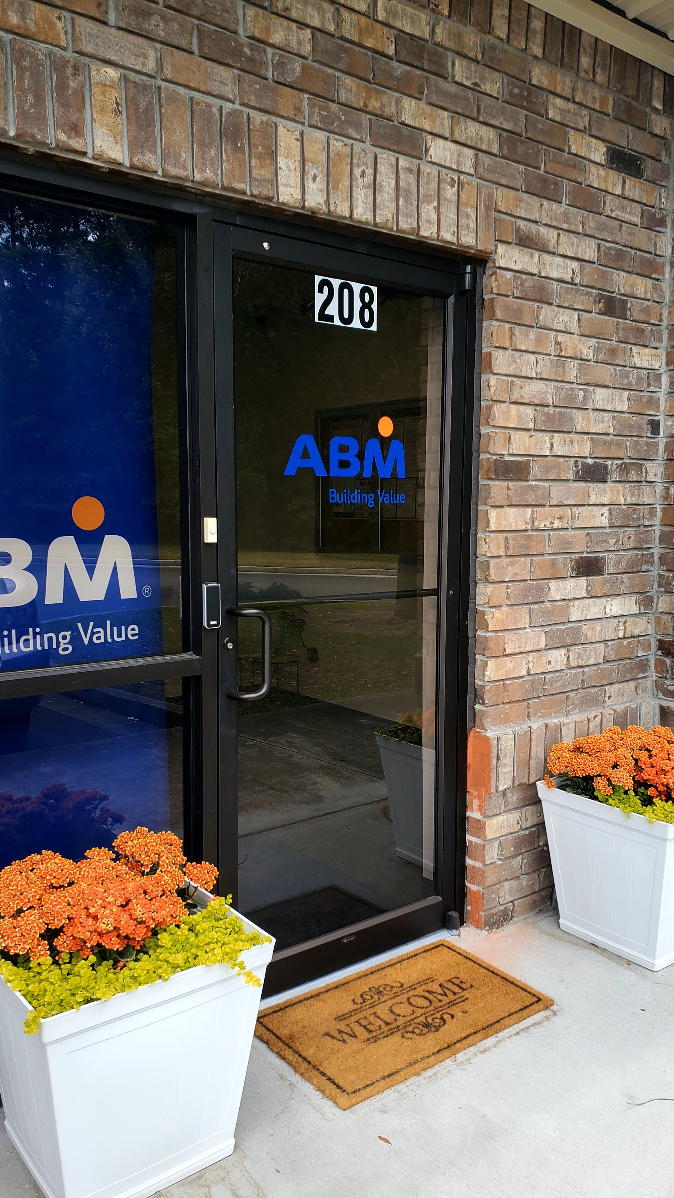 Storefront door and window logo graphics, ABM, Pooler, GA, by High Stakes Creative
