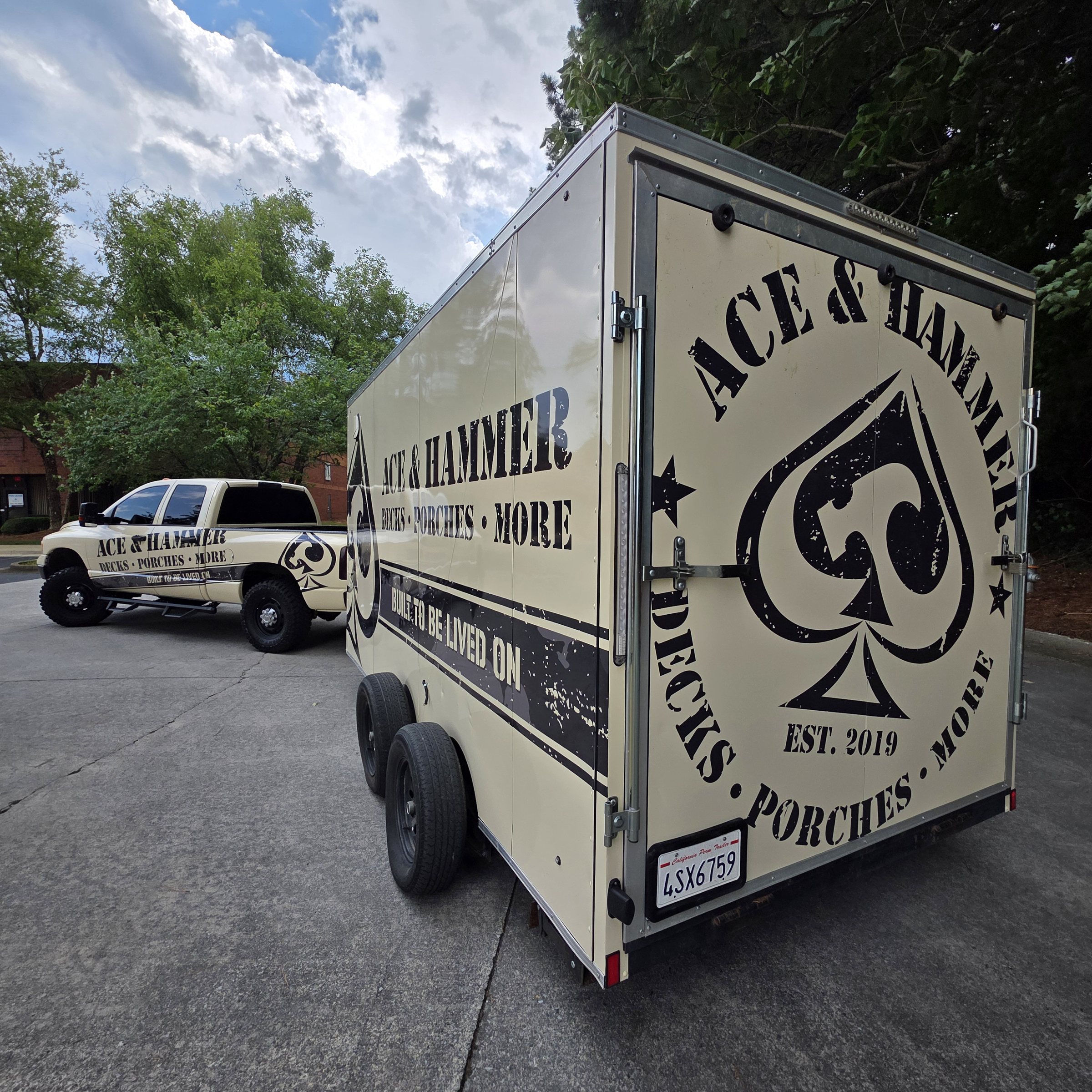 Enclosed trailer wrap, rear three-quarter view, Ace & Hammer, by High Stakes Creative