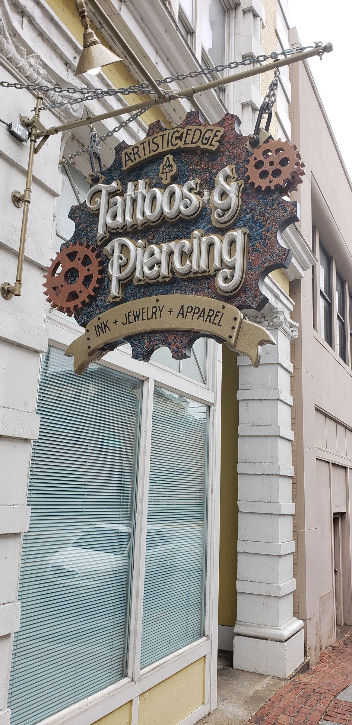 Blade sign, alternate angle, Artistic Edge Tattoos & Piercing, by High Stakes Creative