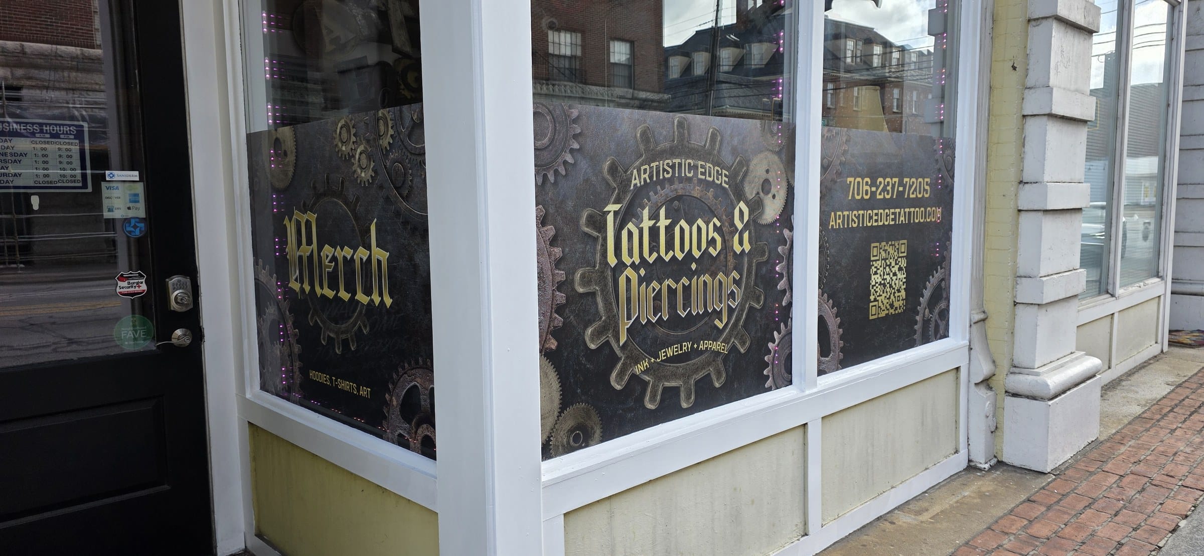Steampunk gear storefront window graphics (Tattoos & Piercings, Merch) and door sidelight , Artistic Edge Tattoos & Piercing, Rome, GA, by High Stakes Creative