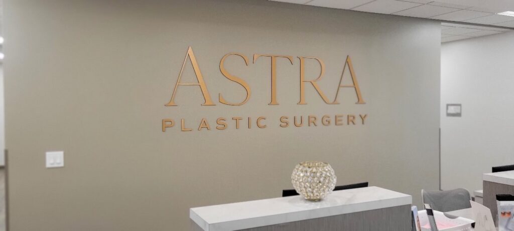Dimensional ASTRA Plastic Surgery letters behind reception desk, Astra Plastic Surgery, by High Stakes Creative