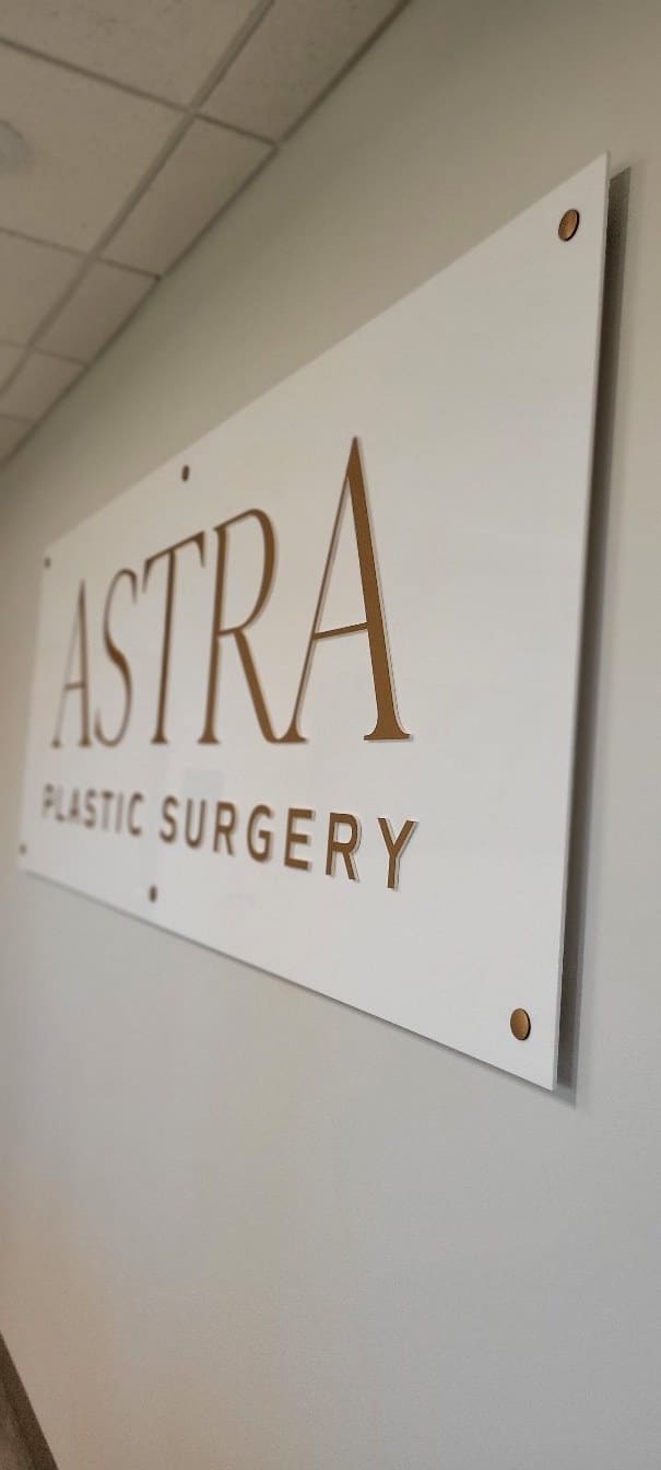 Close angle on acrylic panel with standoffs, Astra Plastic Surgery, by High Stakes Creative