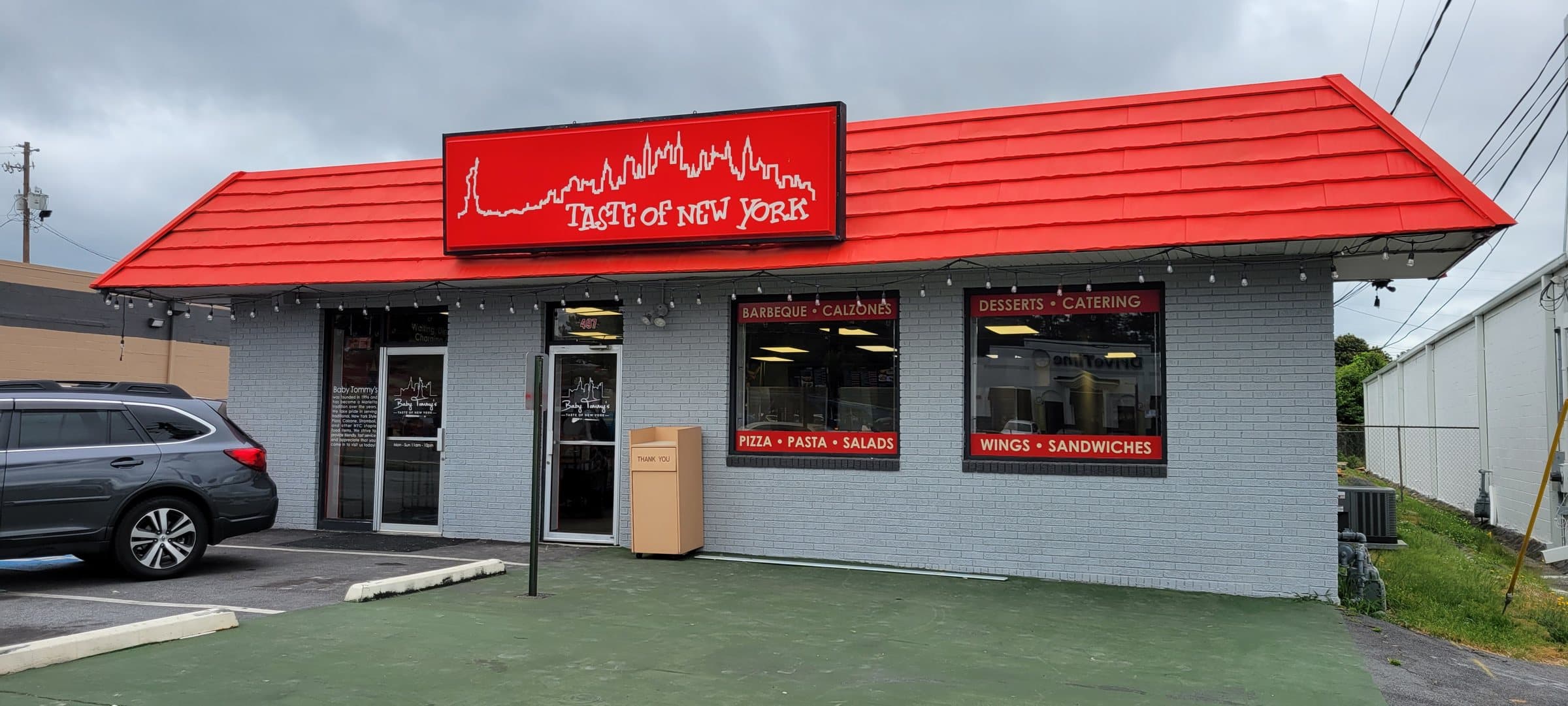 Restaurant storefront with window and door vinyl, Baby Tommy's Taste of New York, by High Stakes Creative