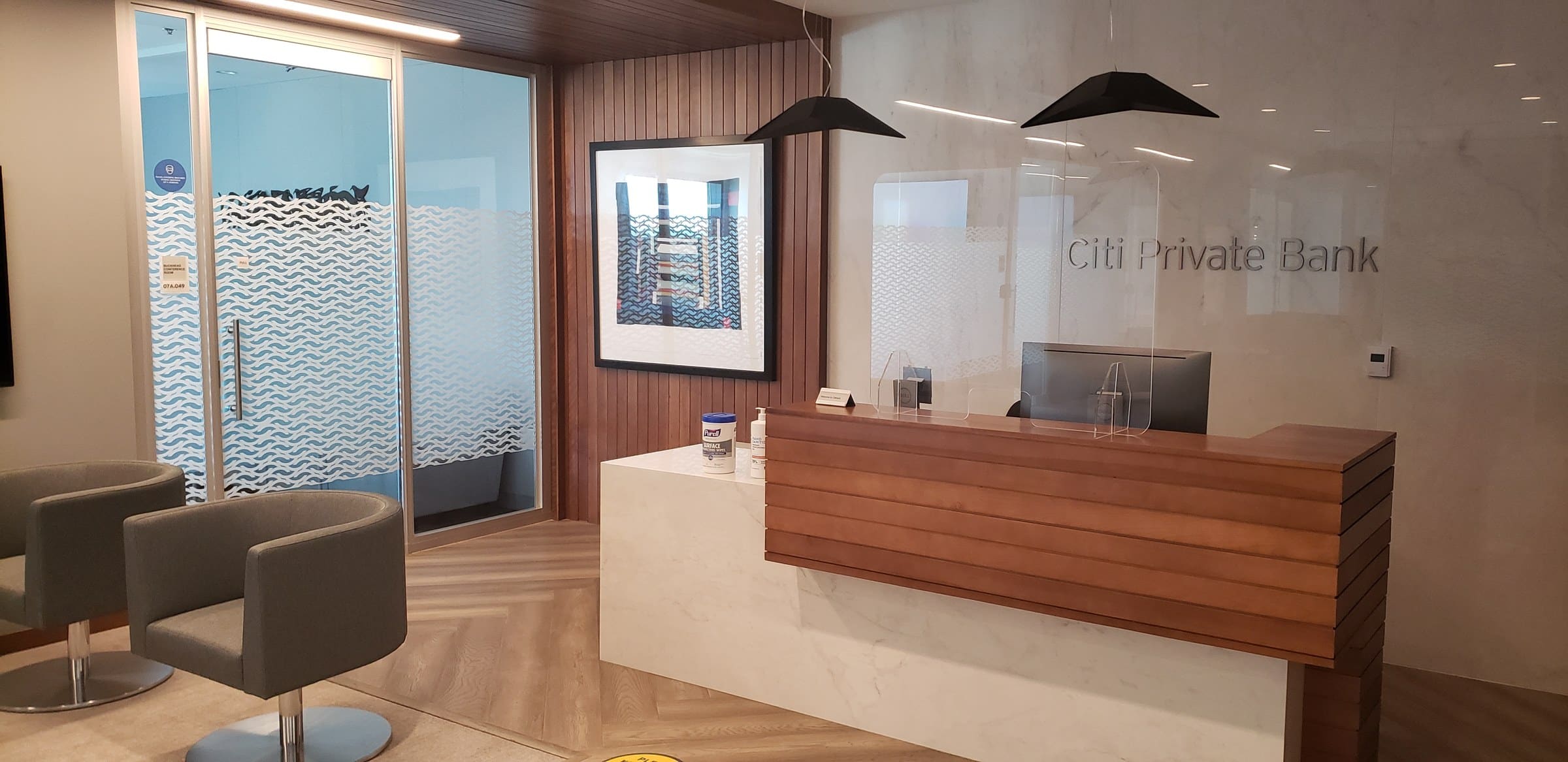 Lobby wall lettering behind reception, Citi Private Bank, Atlanta, GA, by High Stakes Creative