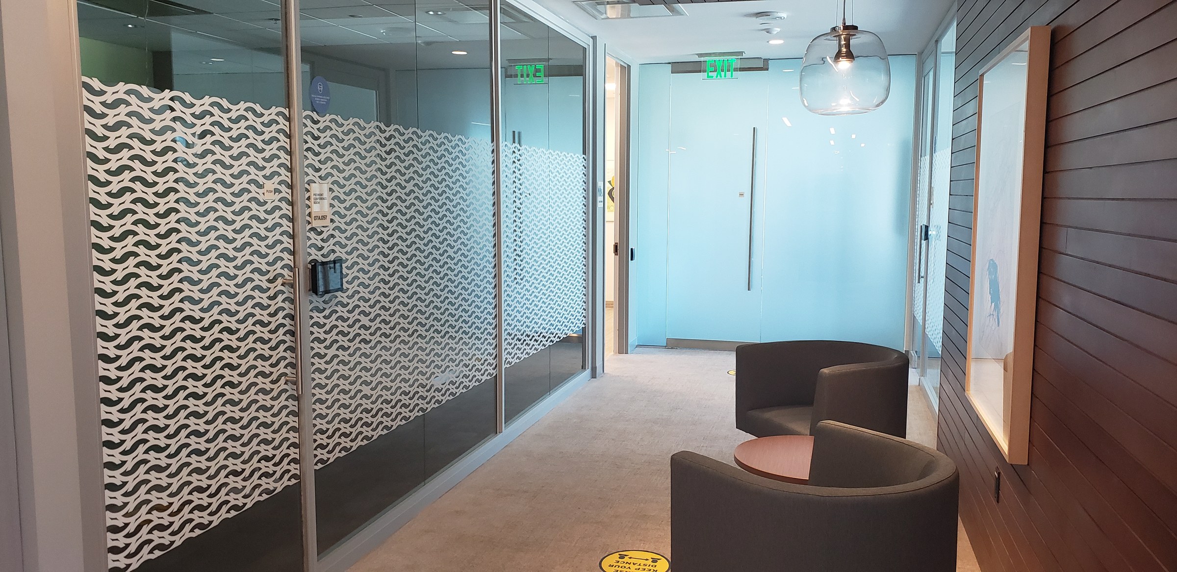 Wave-pattern frosted film on glass offices, Citi Private Bank, Atlanta, GA, by High Stakes Creative