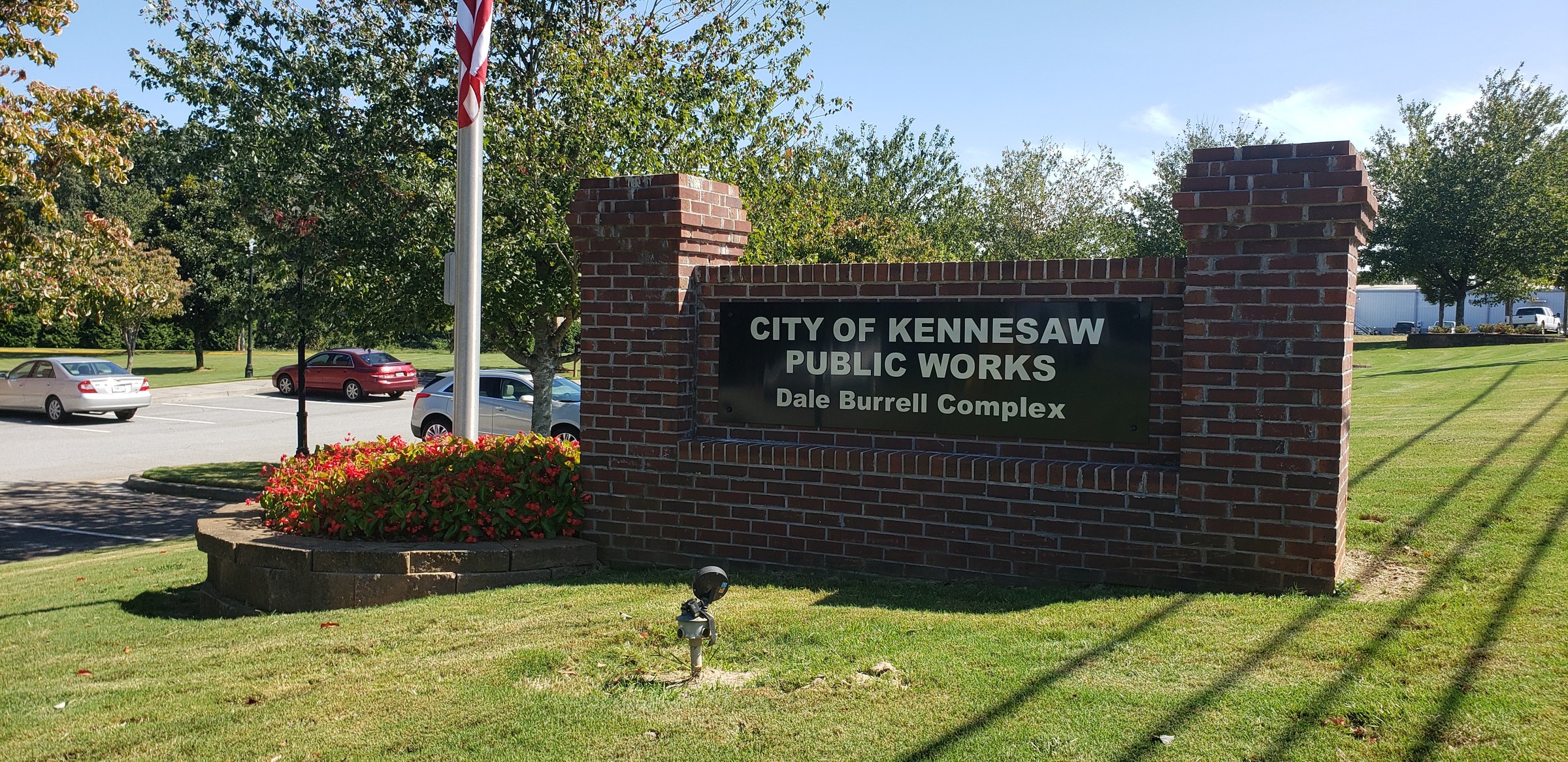 Public Works brick monument sign and flower bed, City of Kennesaw, by High Stakes Creative