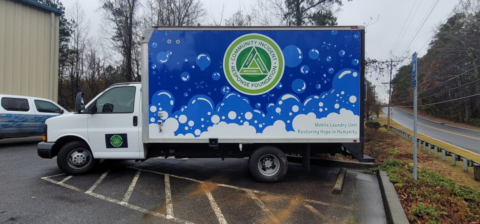 Mobile Laundry Unit box truck wrap with bubble graphics and foundation seal, Community Incident Response Foundation, by High Stakes Creative
