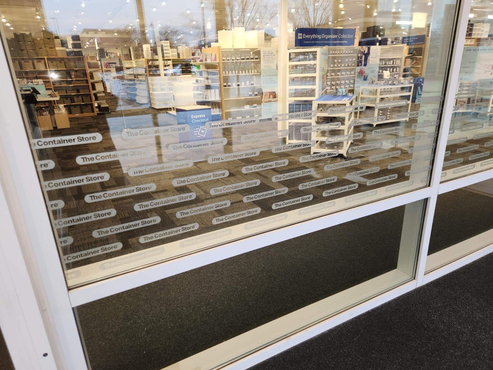 Patterned frosted film on the entry vestibule glass, The Container Store, Alpharetta, GA, by High Stakes Creative