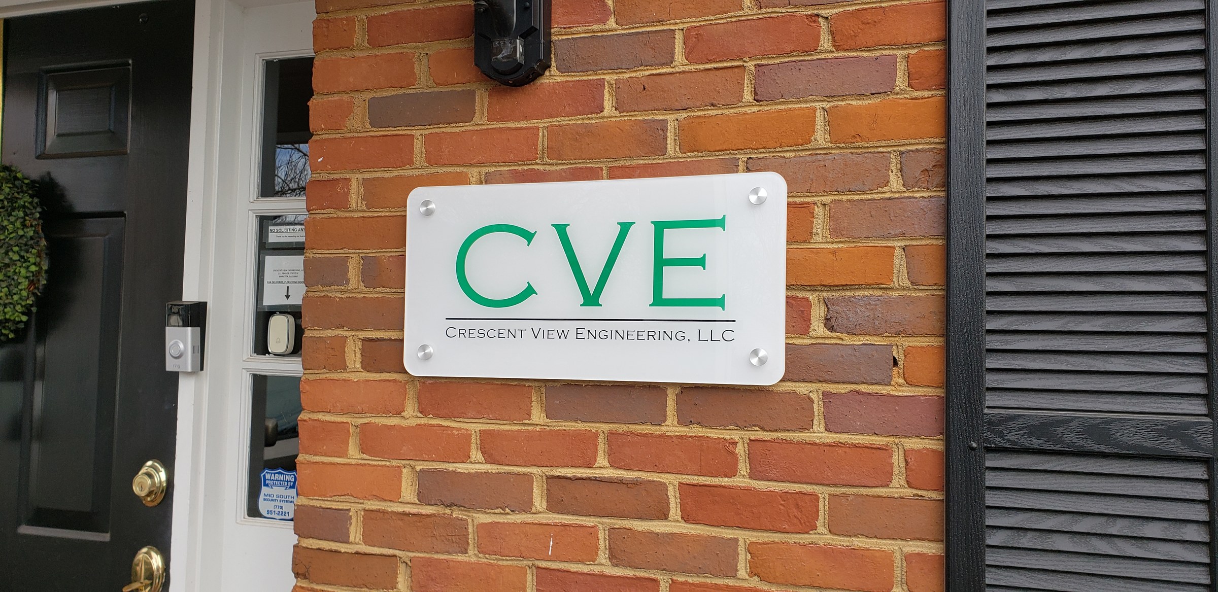 Closer view of CVE plaque, Crescent View Engineering, by High Stakes Creative