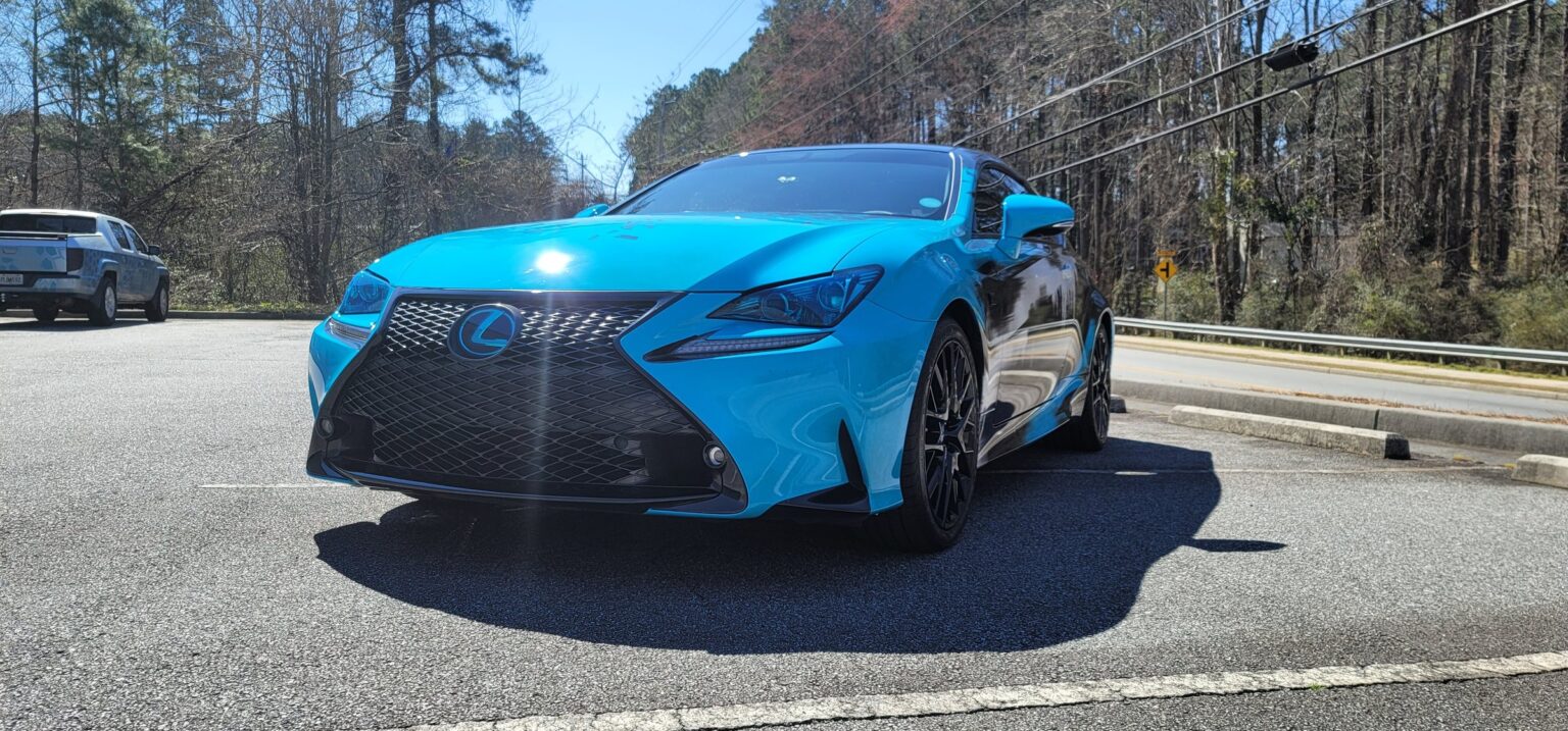Custom printed paint-splatter wrap on Lexus RC coupe, front view, by High Stakes Creative