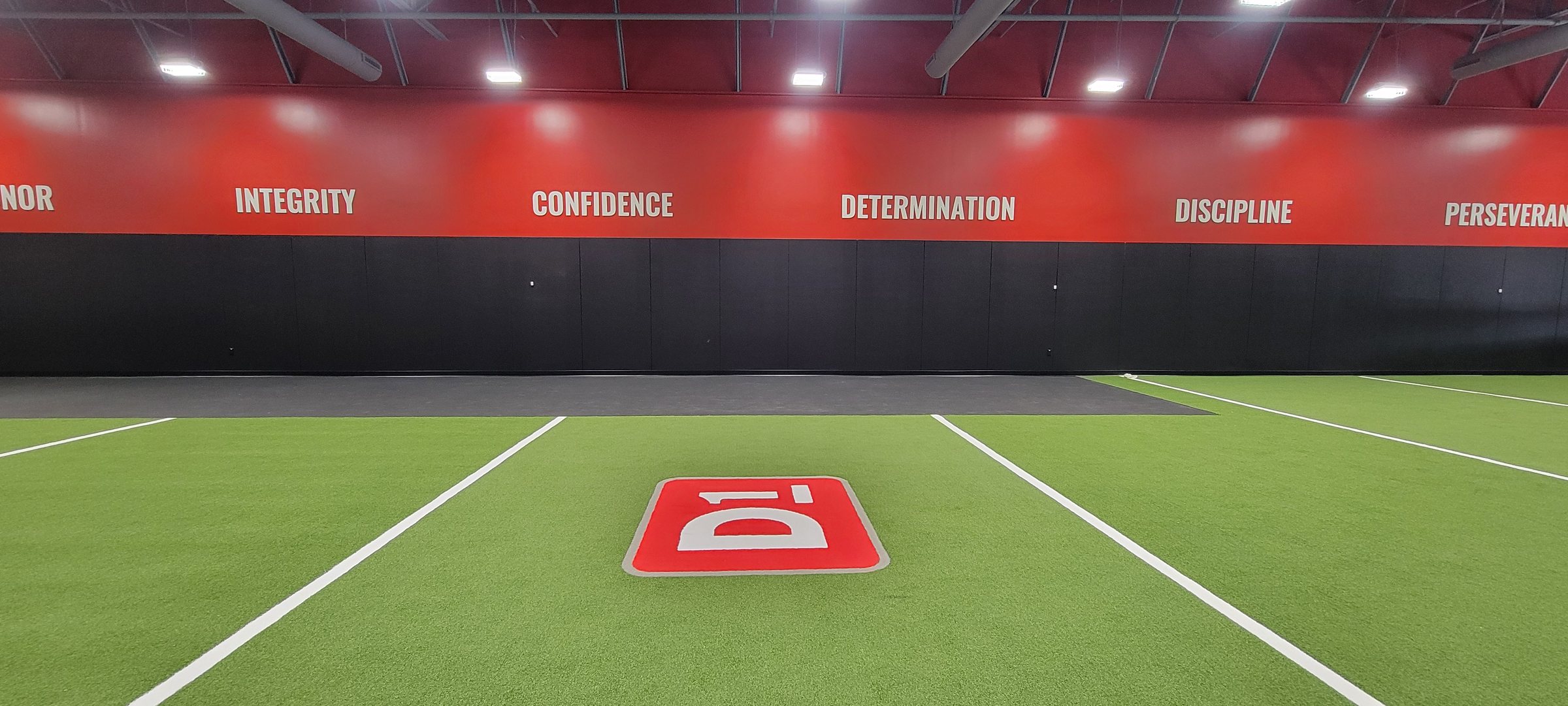 Core values wall graphic band and turf logo, D1 Training, Marietta, GA, by High Stakes Creative