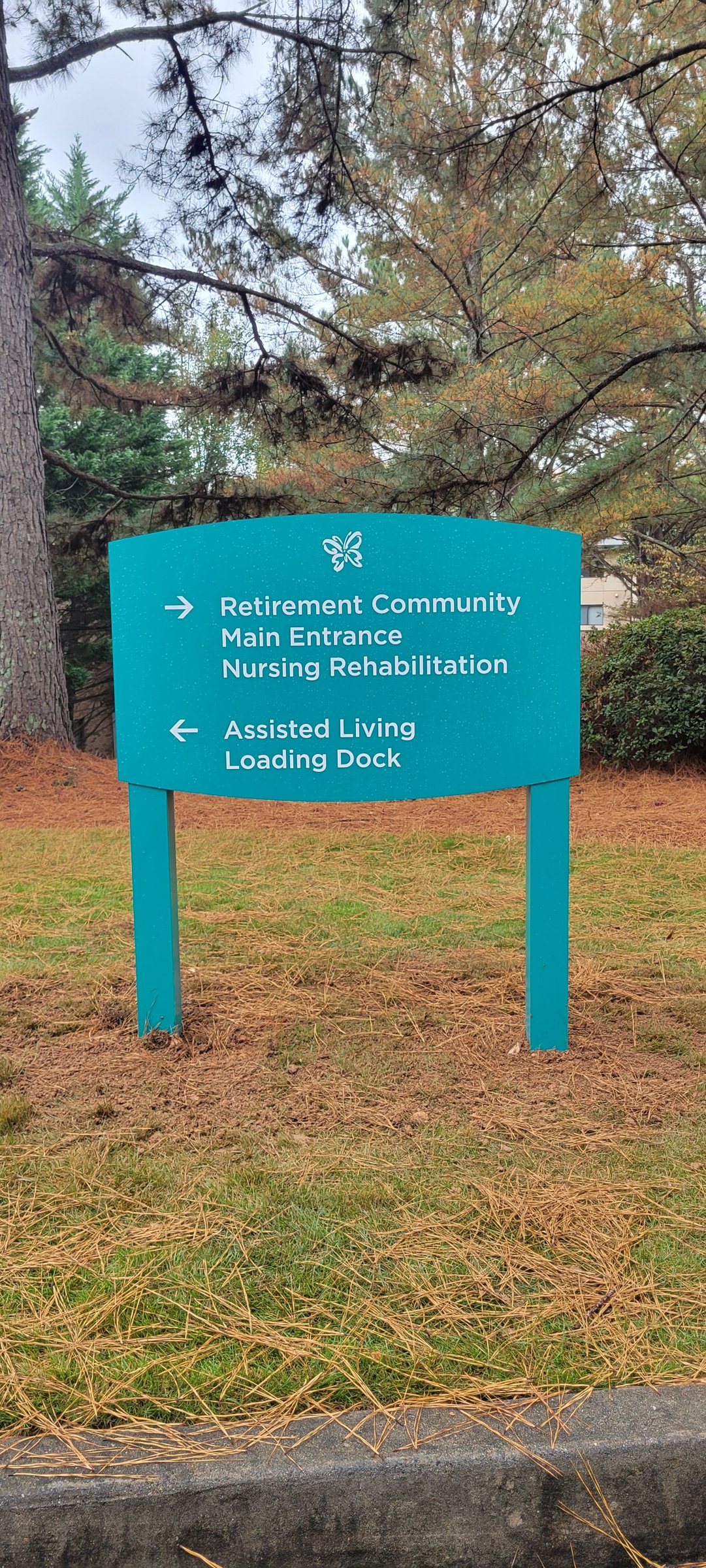 Post-mounted campus directional wayfinding sign, Delmar Gardens, Gwinnett County, GA, by High Stakes Creative