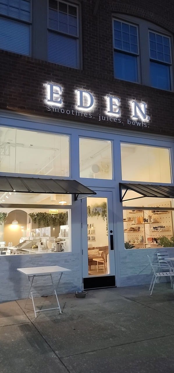 Lit letters at night, EDEN, by High Stakes Creative