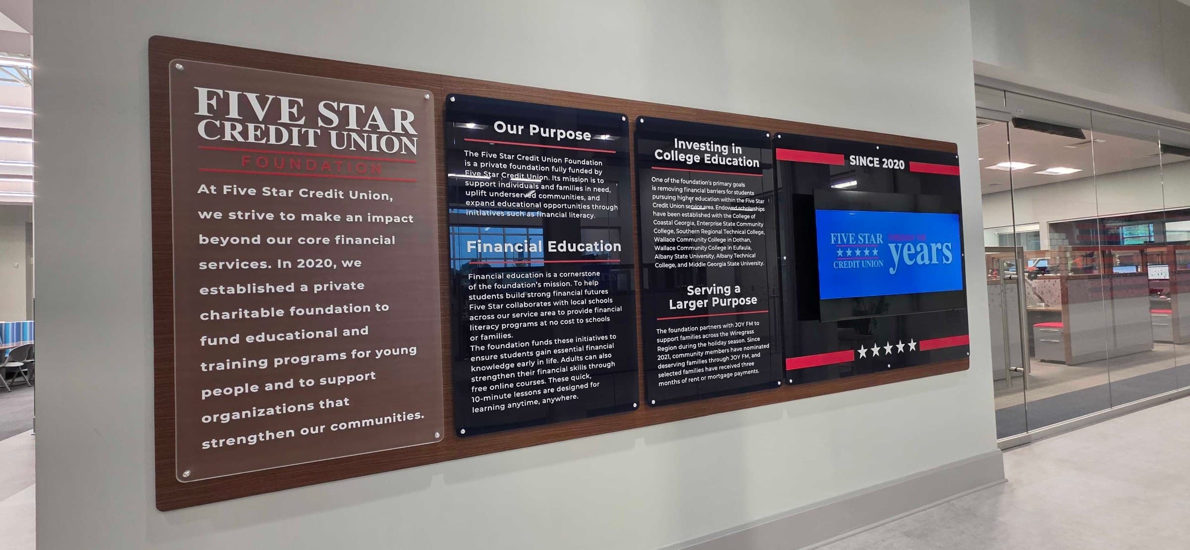 History and mission wall, black PVC backer with TV surround, Five Star Credit Union, Dothan, AL, by High Stakes Creative