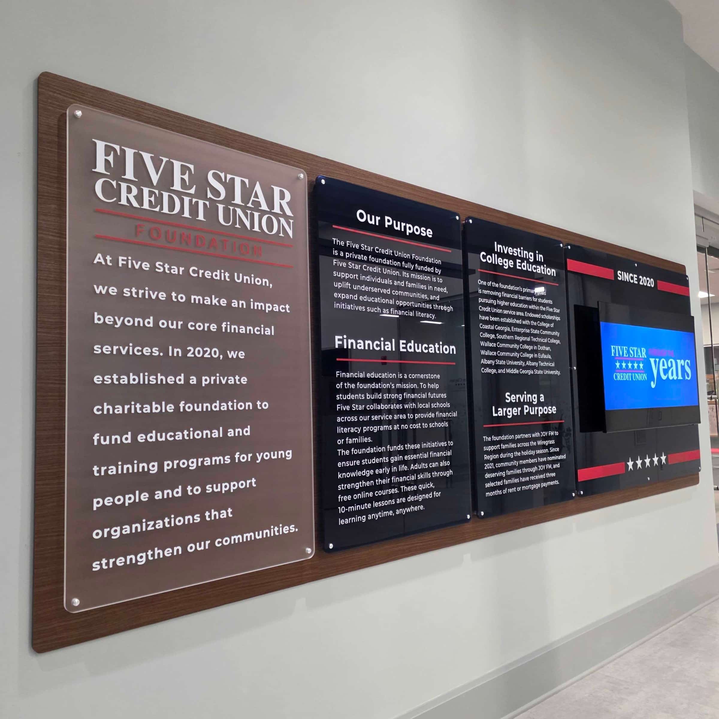 History and mission wall, black PVC backer with TV surround, Five Star Credit Union, Dothan, AL, by High Stakes Creative