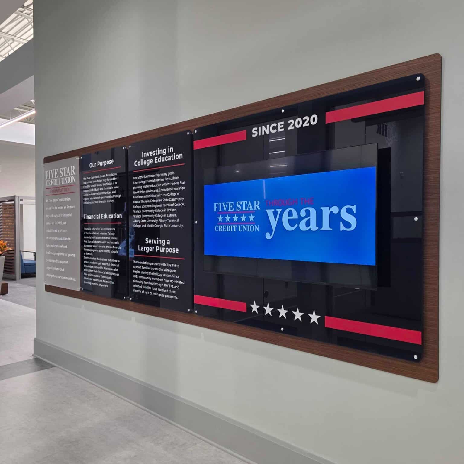 History and mission wall, black PVC backer with TV surround, Five Star Credit Union, Dothan, AL, by High Stakes Creative